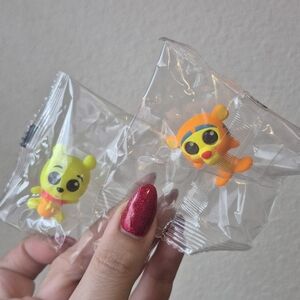 Cute Yellow and Orange Figurines